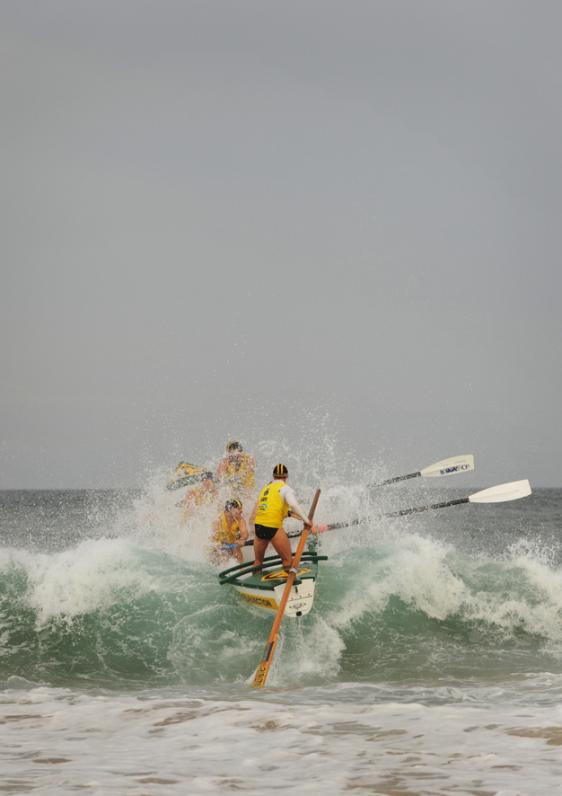 Reserves mens team Fairymeadow Finger Blasters compete in the Navy Surf Boat Challenge on Wollongong City Beach.