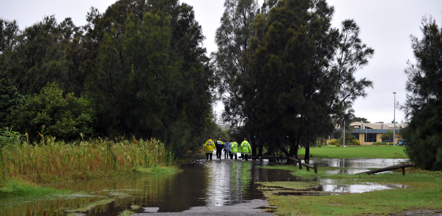The body of a deceased man was found floating beside the Warilla Sports Club after being sucked under in the Oakleigh Creek during flash flooding across the Illawarra region.